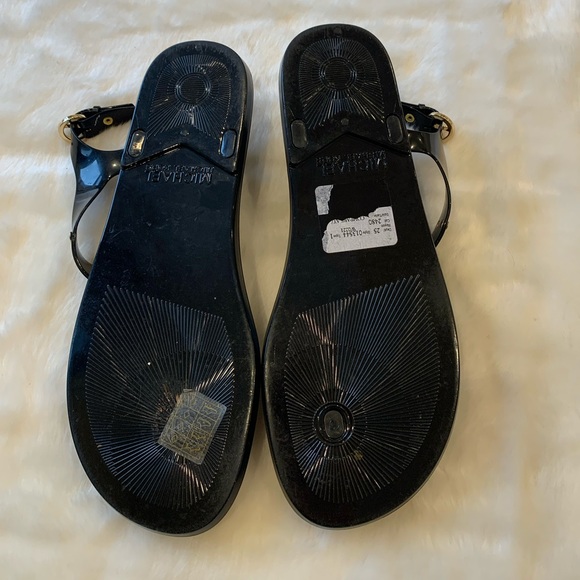 Black and gold Michael Kors thong sandals. - Picture 3 of 5